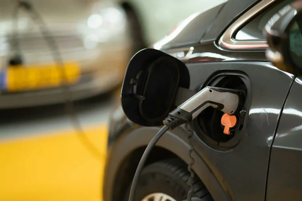 electric car charging image on mission sustainability